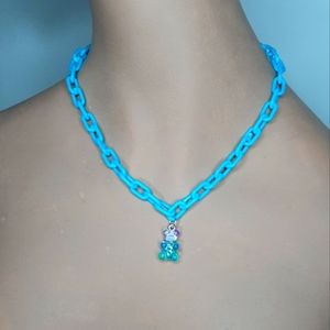Plastic Blue Link Necklace with Blue & Purple Gillter Gummybear Pendant.